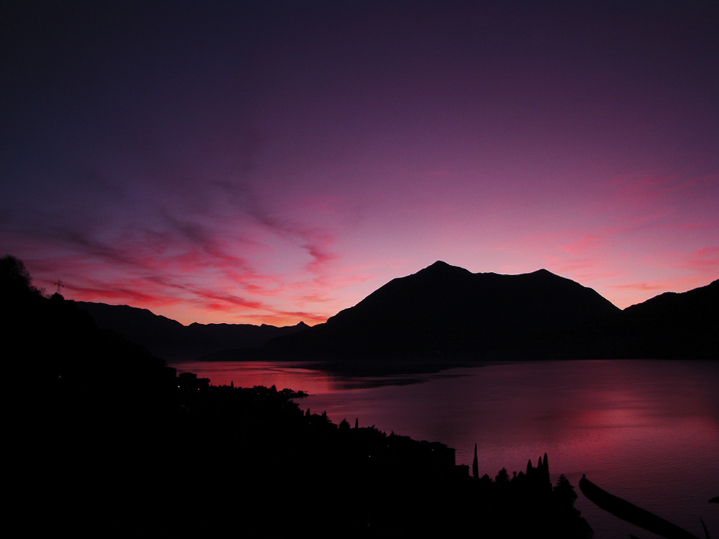Pink sunset hues over the Lake of Como